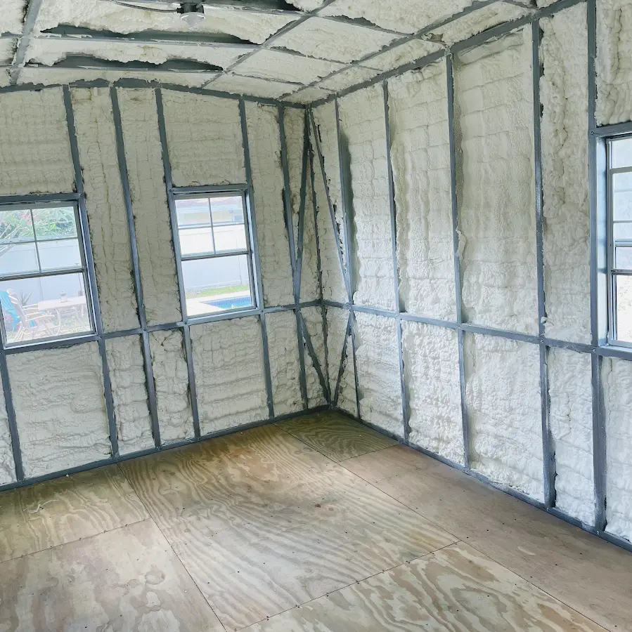 Closed-cell spray foam insulation applied to wall cavities in a residential project in Reidsville